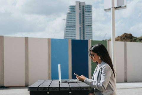 A woman scroll through phone