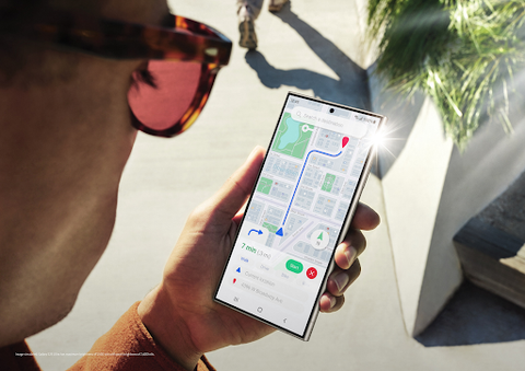A man looking through Google Maps